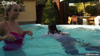Cute Girls Take A Fully Clothed Dip In The Pool Screencap 56 on www.sinx.com