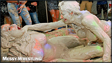 Latest deal - Messy Wrestling: Tattooed Beauty, Ripped Clothes & Lots Of Mud Covered Booby & Booty!