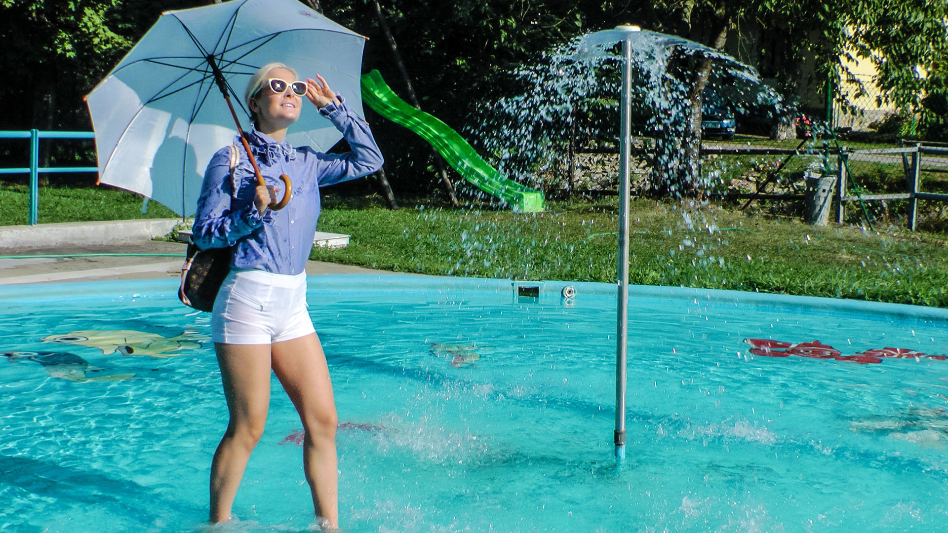 Playful Blonde Gets Drenched Under Water Fountain on www.sinx.com