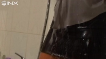 Clothed Busty Babe Gets Clean In Bathroom Screencap 42 on www.sinx.com