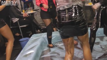 Messy Wrestling: Two Rowdy Audience Rumbles In The Oil End In Shiny See-Through Clothes! Screencap 24 on www.sinx.com