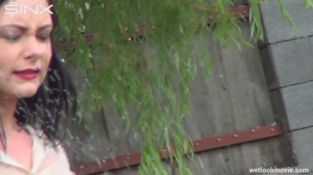 Brunette's Very Wet Sprinkler Frolic Screencap 23 on www.sinx.com