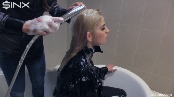 Blonde and brunette shampooing one another Screencap 13 on www.sinx.com