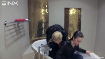 Blonde and brunette shampooing one another Screencap 24 on www.sinx.com