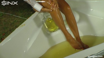 Heeled Babe Oils Up In Bathtub Screencap 22 on www.sinx.com
