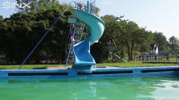 Waterpark Fun For Fully Clothed Brunette Babe Screencap 2 on www.sinx.com