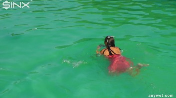 Waterpark Fun For Fully Clothed Brunette Babe Screencap 21 on www.sinx.com