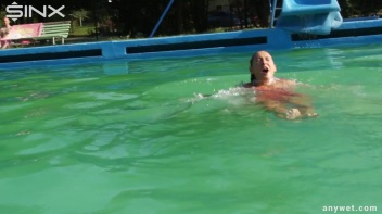 Waterpark Fun For Fully Clothed Brunette Babe Screencap 24 on www.sinx.com