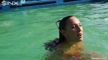 Waterpark Fun For Fully Clothed Brunette Babe Screencap 25 on www.sinx.com
