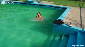 Waterpark Fun For Fully Clothed Brunette Babe Screencap 27 on www.sinx.com