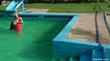 Waterpark Fun For Fully Clothed Brunette Babe Screencap 33 on www.sinx.com