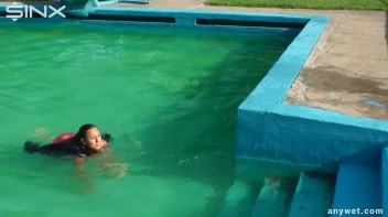 Waterpark Fun For Fully Clothed Brunette Babe Screencap 34 on www.sinx.com