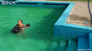 Waterpark Fun For Fully Clothed Brunette Babe Screencap 35 on www.sinx.com