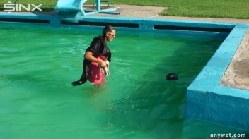 Waterpark Fun For Fully Clothed Brunette Babe Screencap 37 on www.sinx.com
