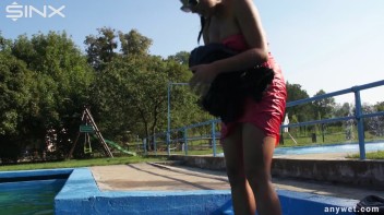 Waterpark Fun For Fully Clothed Brunette Babe Screencap 43 on www.sinx.com