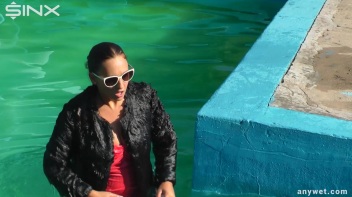 Waterpark Fun For Fully Clothed Brunette Babe Screencap 47 on www.sinx.com