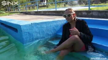 Waterpark Fun For Fully Clothed Brunette Babe Screencap 49 on www.sinx.com