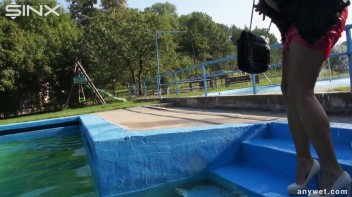 Waterpark Fun For Fully Clothed Brunette Babe Screencap 54 on www.sinx.com