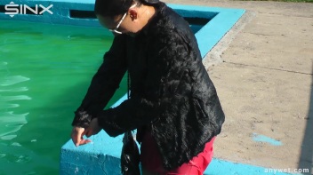 Waterpark Fun For Fully Clothed Brunette Babe Screencap 9 on www.sinx.com