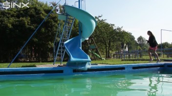 Waterpark Fun For Fully Clothed Brunette Babe Screencap 1 on www.sinx.com