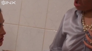 Lesbians Have Clothed Dildo Bath Fun Screencap 43 on www.sinx.com