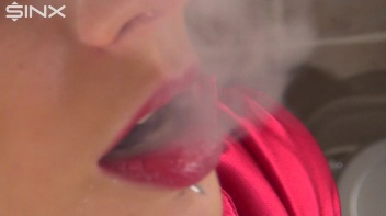 Raven Haired Hottie Smokes In The Kitchen Screencap 24 on www.sinx.com