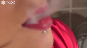 Raven Haired Hottie Smokes In The Kitchen Screencap 26 on www.sinx.com