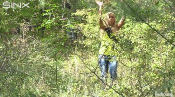 Blonde Hottie Tied Up Outdoors By Masked Man Screencap 2 on www.sinx.com