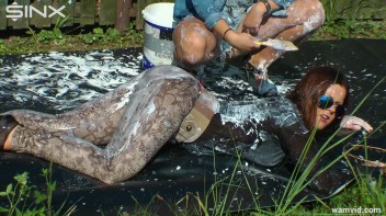 Curvy brunette and blonde get drenched in sticky white paint Screencap 37 on www.sinx.com