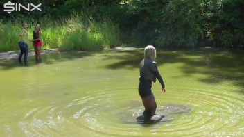 Muddy Water Catfight Leaves Babes Soaking Wet Screencap 28 on www.sinx.com