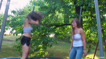 Cute Brunettes Get Drenched On Trampoline Screencap 9 on www.sinx.com
