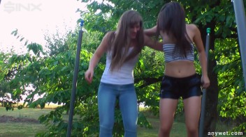 Cute Brunettes Get Drenched On Trampoline Screencap 15 on www.sinx.com