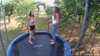 Cute Brunettes Get Drenched On Trampoline Screencap 17 on www.sinx.com