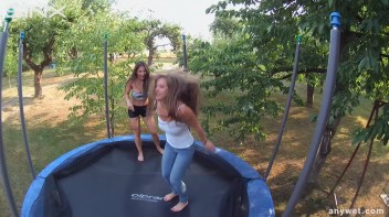 Cute Brunettes Get Drenched On Trampoline Screencap 18 on www.sinx.com
