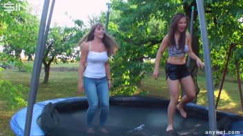 Cute Brunettes Get Drenched On Trampoline Screencap 20 on www.sinx.com