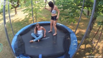 Cute Brunettes Get Drenched On Trampoline Screencap 23 on www.sinx.com