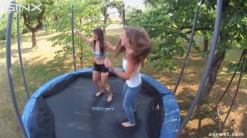 Cute Brunettes Get Drenched On Trampoline Screencap 25 on www.sinx.com