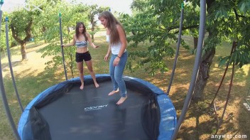 Cute Brunettes Get Drenched On Trampoline Screencap 29 on www.sinx.com