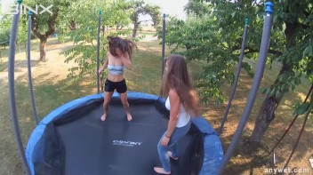Cute Brunettes Get Drenched On Trampoline Screencap 3 on www.sinx.com