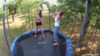 Cute Brunettes Get Drenched On Trampoline Screencap 30 on www.sinx.com
