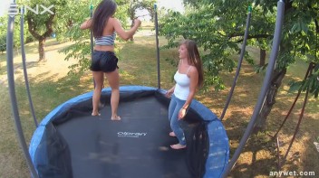 Cute Brunettes Get Drenched On Trampoline Screencap 31 on www.sinx.com