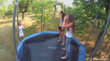 Cute Brunettes Get Drenched On Trampoline Screencap 38 on www.sinx.com