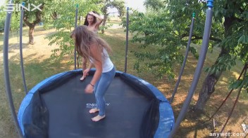 Cute Brunettes Get Drenched On Trampoline Screencap 4 on www.sinx.com