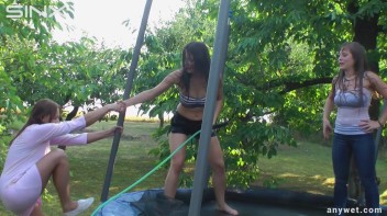 Cute Brunettes Get Drenched On Trampoline Screencap 45 on www.sinx.com