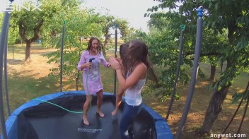 Cute Brunettes Get Drenched On Trampoline Screencap 48 on www.sinx.com