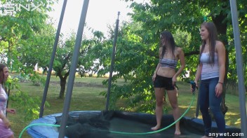 Cute Brunettes Get Drenched On Trampoline Screencap 53 on www.sinx.com