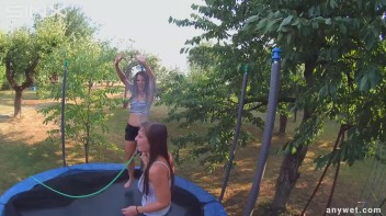 Cute Brunettes Get Drenched On Trampoline Screencap 54 on www.sinx.com