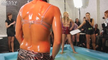 Messy Wrestling:  Roughin' It Up In The Oil Till They're Shredded Down To The Panties! Regular Footage!!! Screencap 60 on www.sinx.com