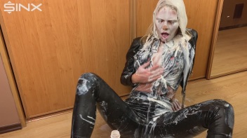 Messy Blonde In Leather Drenches Herself In Cream Screencap 48 on www.sinx.com
