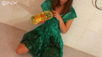 Sexy Babe In Satin Drenches Herself In Oil Screencap 16 on www.sinx.com
